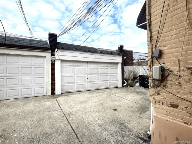 a view of a white building with many windows