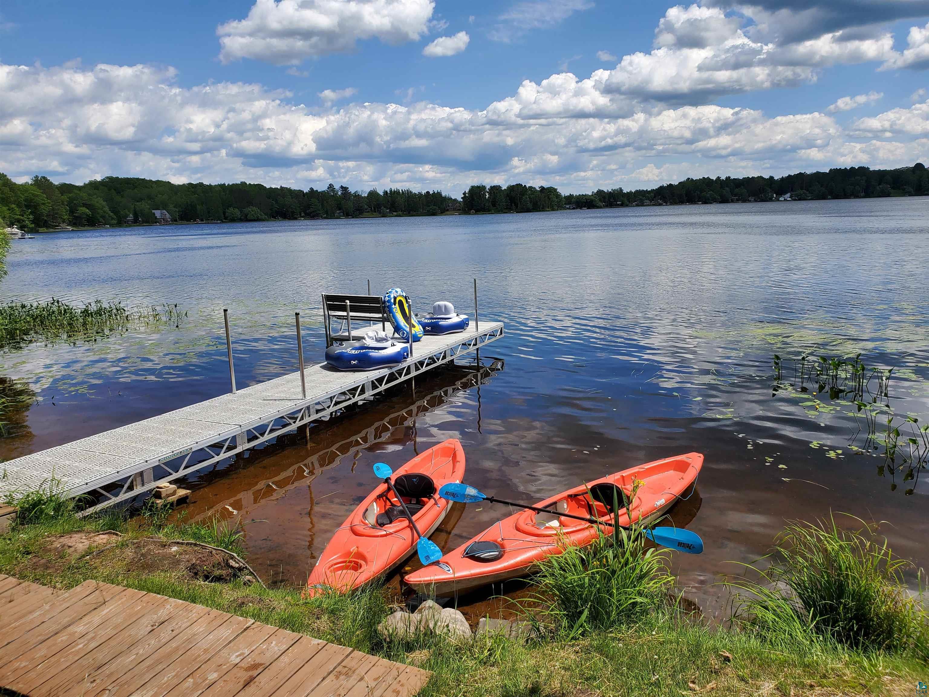 4822 East Tri Lakes Road Superior, WI 54880 - Photo 51 of 56 Dock area with a water view and a forest view