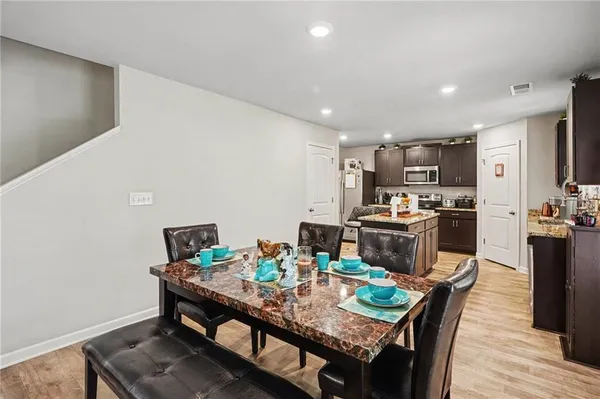 a view of a dining room with furniture