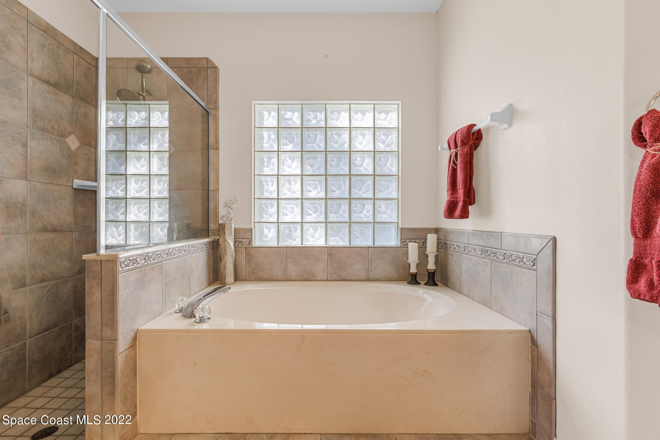 3650 Shady Run Road Melbourne, FL 32934 - Photo 19 of 43 a bedroom with a bed and a window