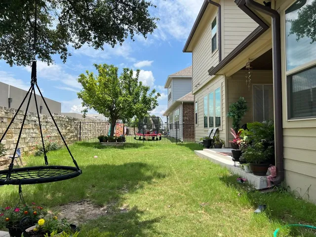 a view of a yard in front of house