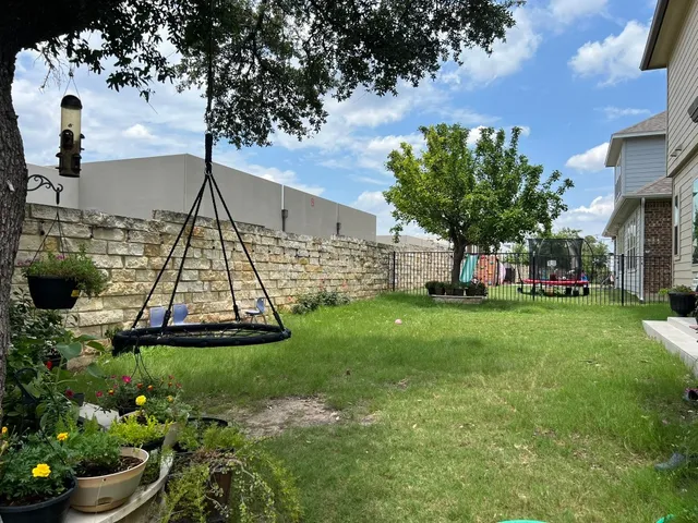 a view of a garden with a slide