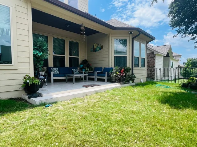 a garden view with a seating space