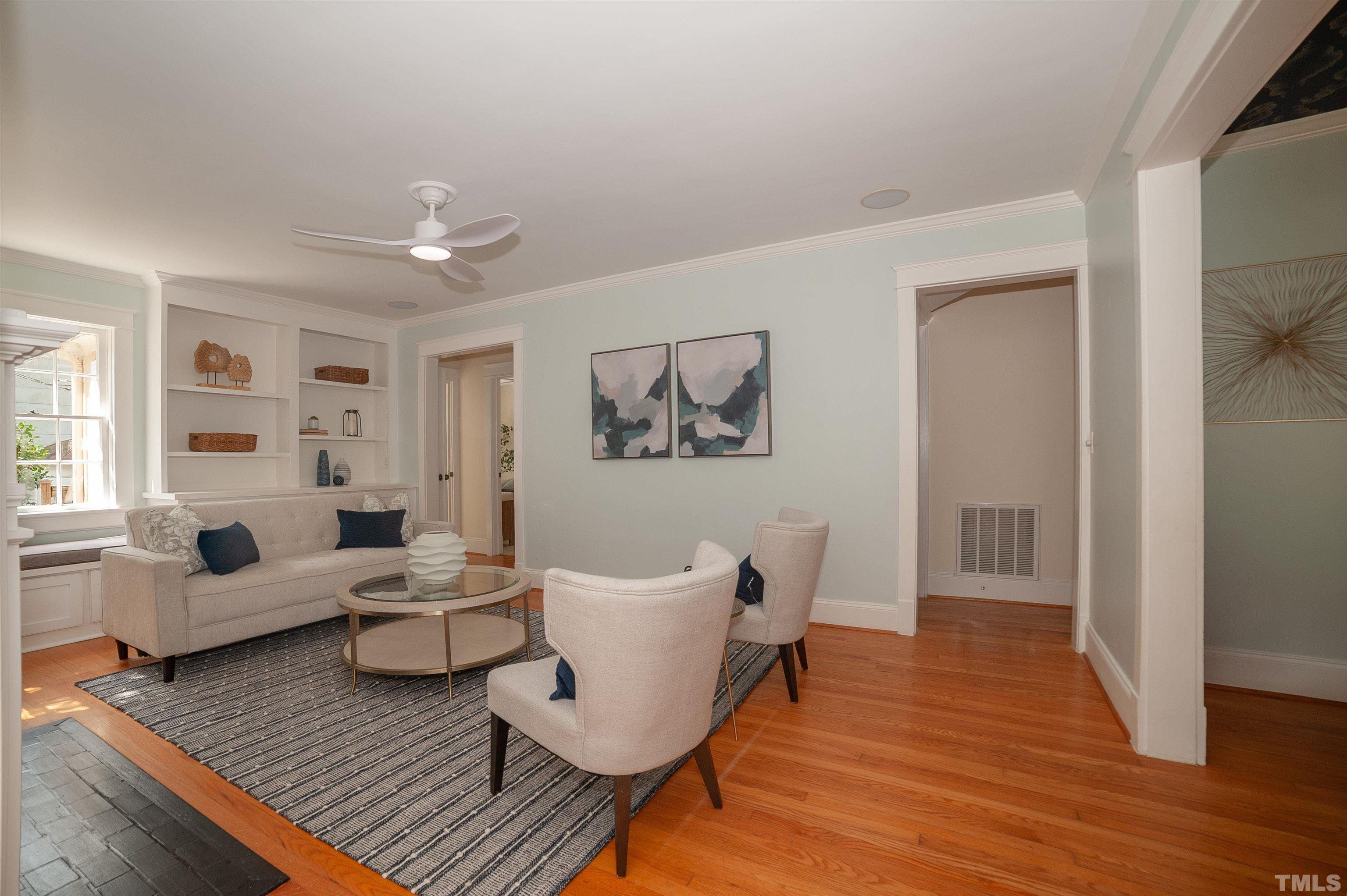 513 Gardner Street Raleigh, NC 27607 - Photo 6 of 56 a living room with furniture and wooden floor