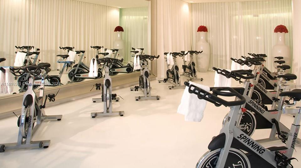 475 Brickell Avenue, Unit 4613 Miami, FL 33131 - Photo 15 of 30 a view of a room with gym equipment