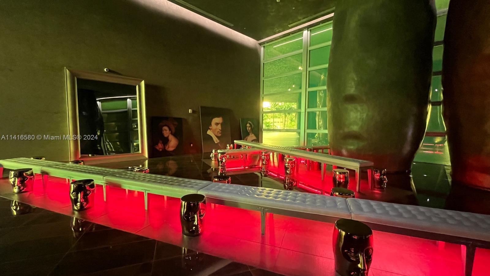 475 Brickell Avenue, Unit 4613 Miami, FL 33131 - Photo 24 of 30 a view of swimming pool with red chairs