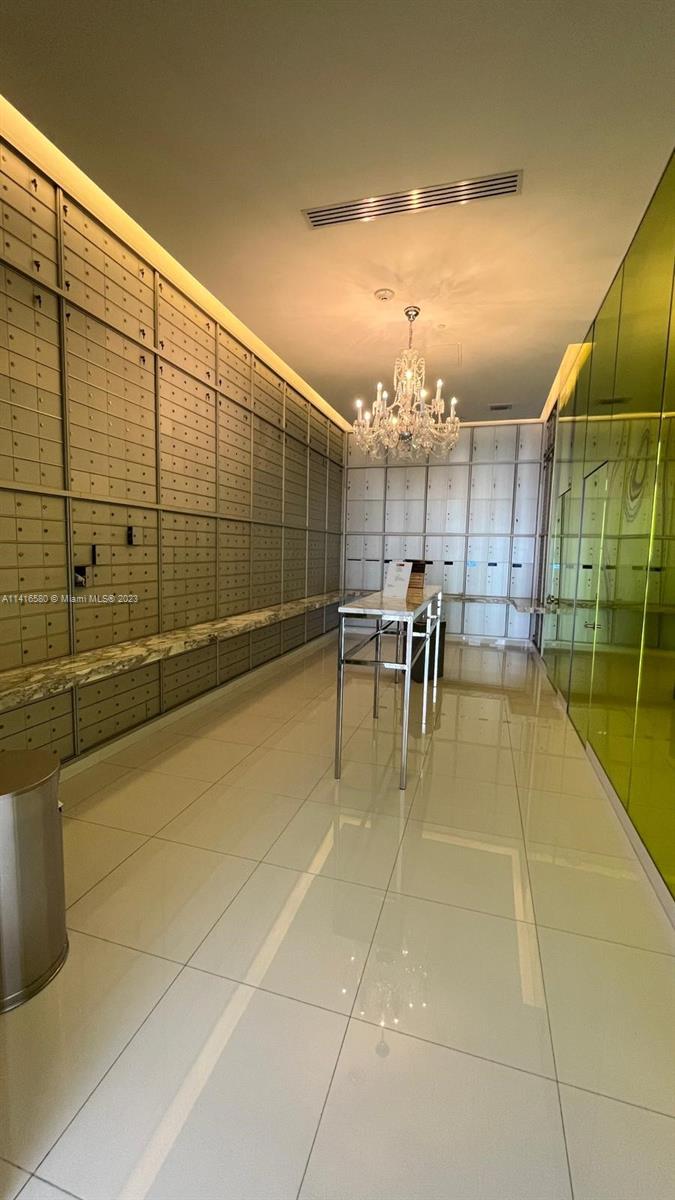 475 Brickell Avenue, Unit 4613 Miami, FL 33131 - Photo 25 of 30 a view of a chairs and table in the kitchen