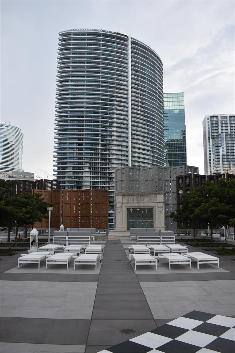 475 Brickell Avenue, Unit 4613 Miami, FL 33131 - Photo 29 of 30 a view of kitchen with stainless steel appliances kitchen island sink stove and granite counter top