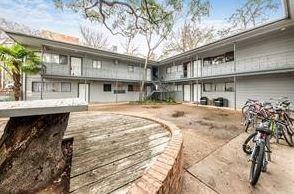 a front view of a building with street