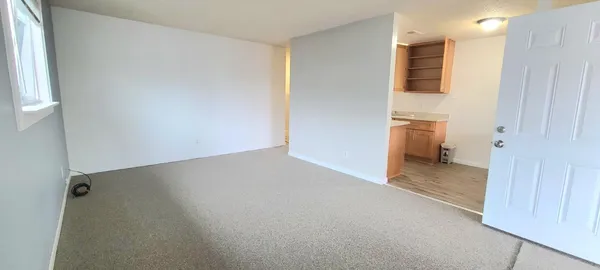 a view of a storage & utility room with a sink