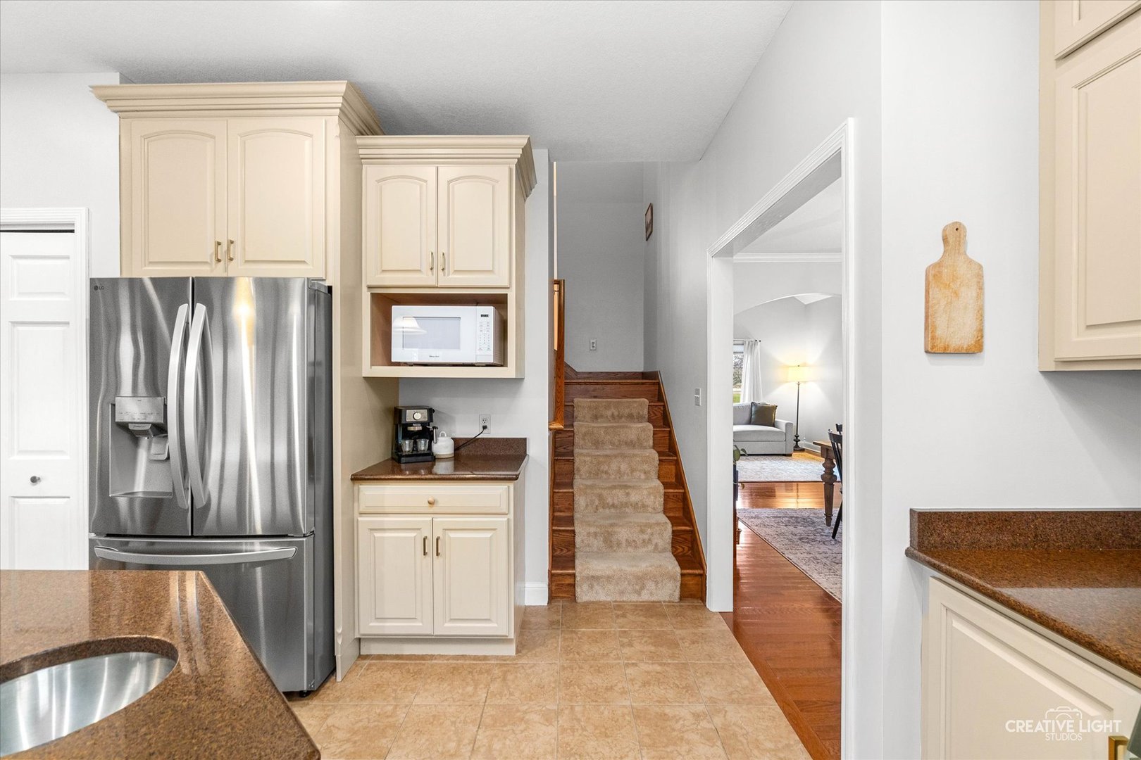 10167 East Deer Creek Lane Rochelle, IL 61068 - Photo 15 of 51 a kitchen with stainless steel appliances granite countertop a refrigerator and a sink