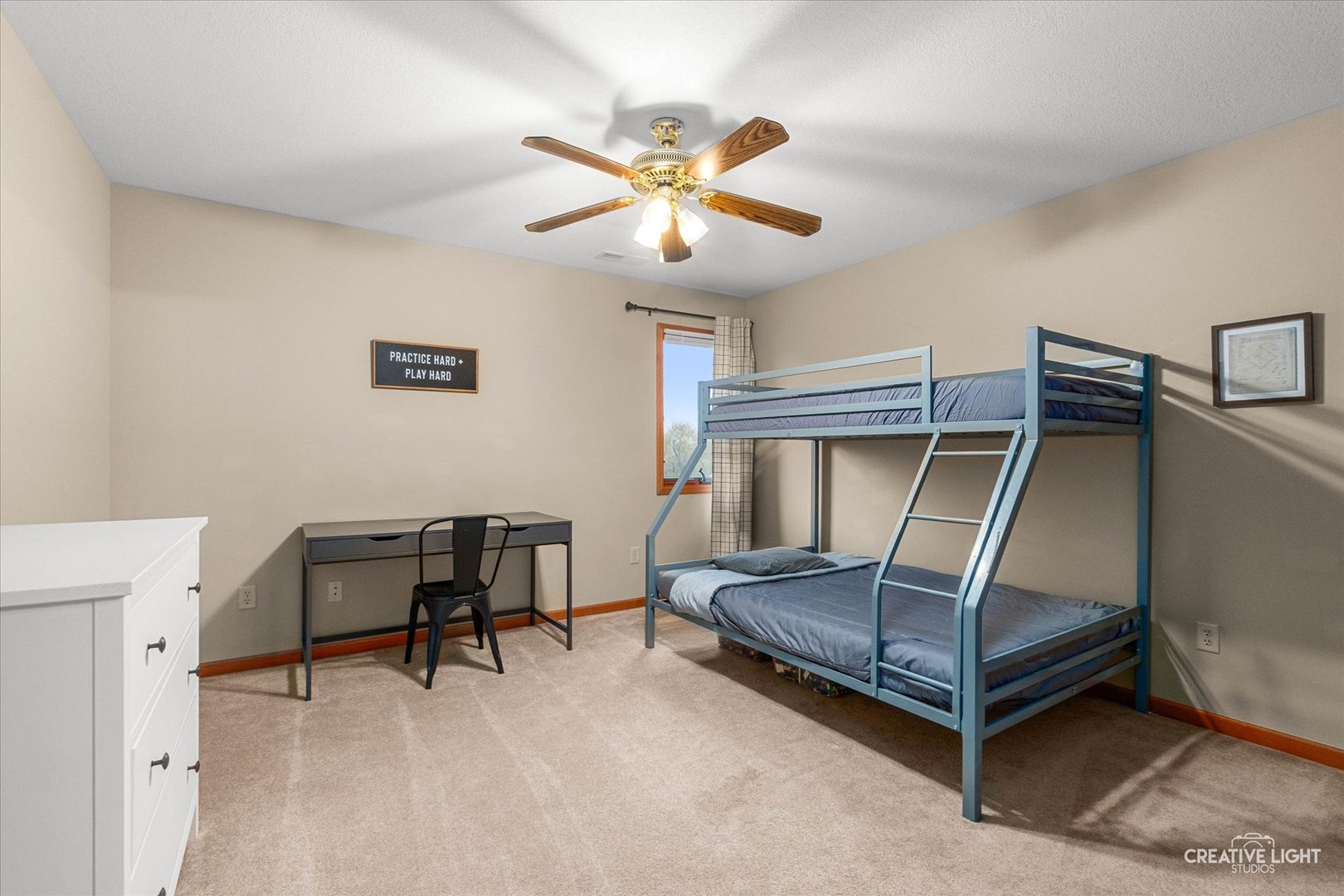 10167 East Deer Creek Lane Rochelle, IL 61068 - Photo 36 of 51 a bedroom with a bed and a ceiling fan