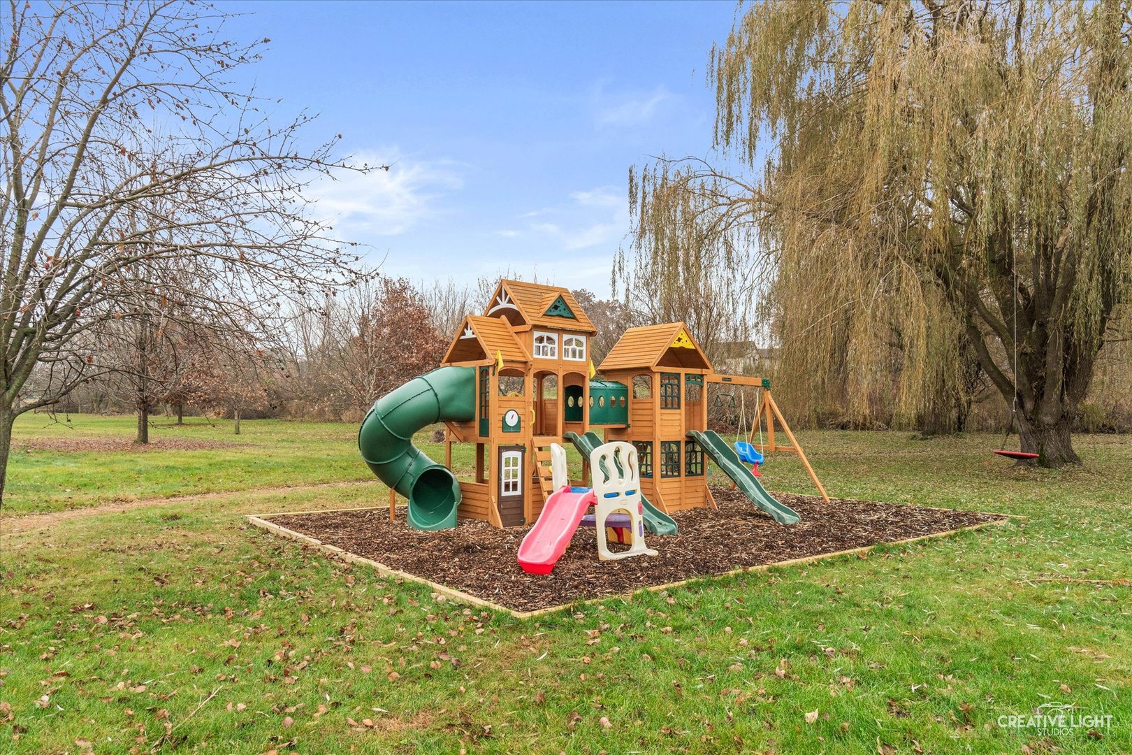 10167 East Deer Creek Lane Rochelle, IL 61068 - Photo 47 of 51 a view of a park with swings