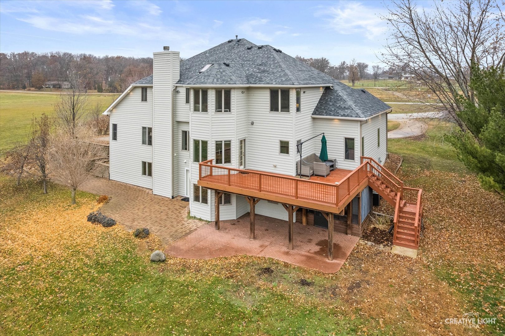 10167 East Deer Creek Lane Rochelle, IL 61068 - Photo 49 of 51 a backyard of a house with table and chairs