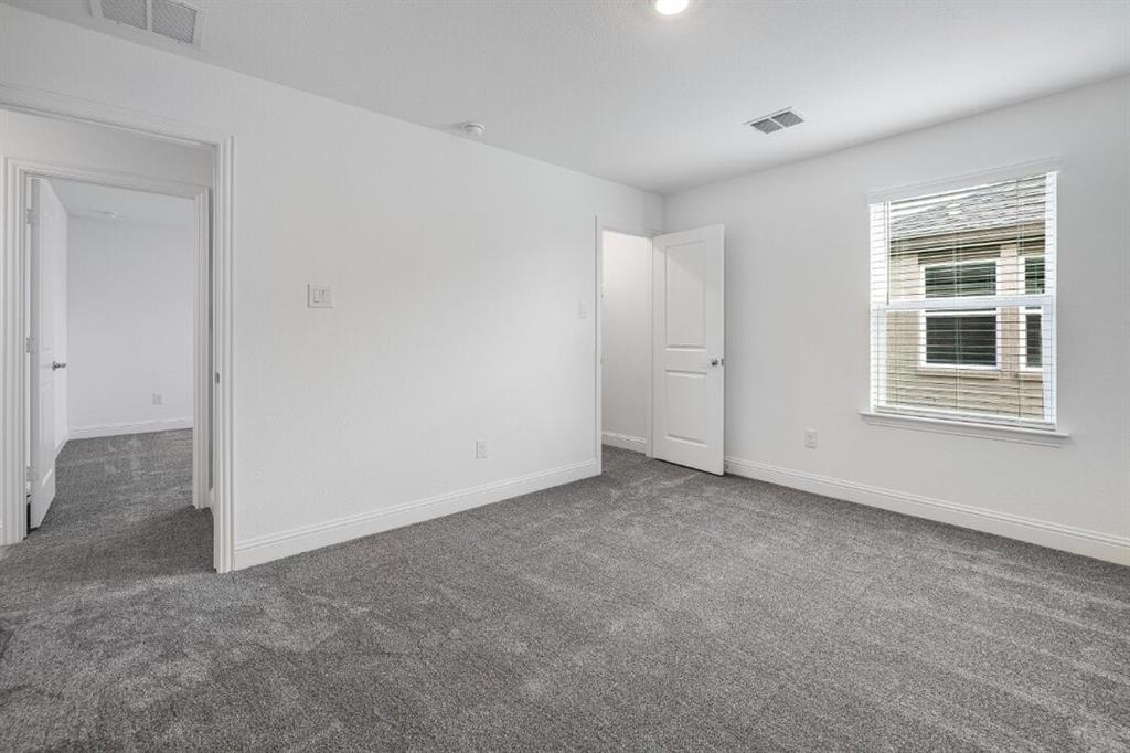 1433 Arciones Road Fort Worth, TX 76052 - Photo 16 of 33 an empty room with windows