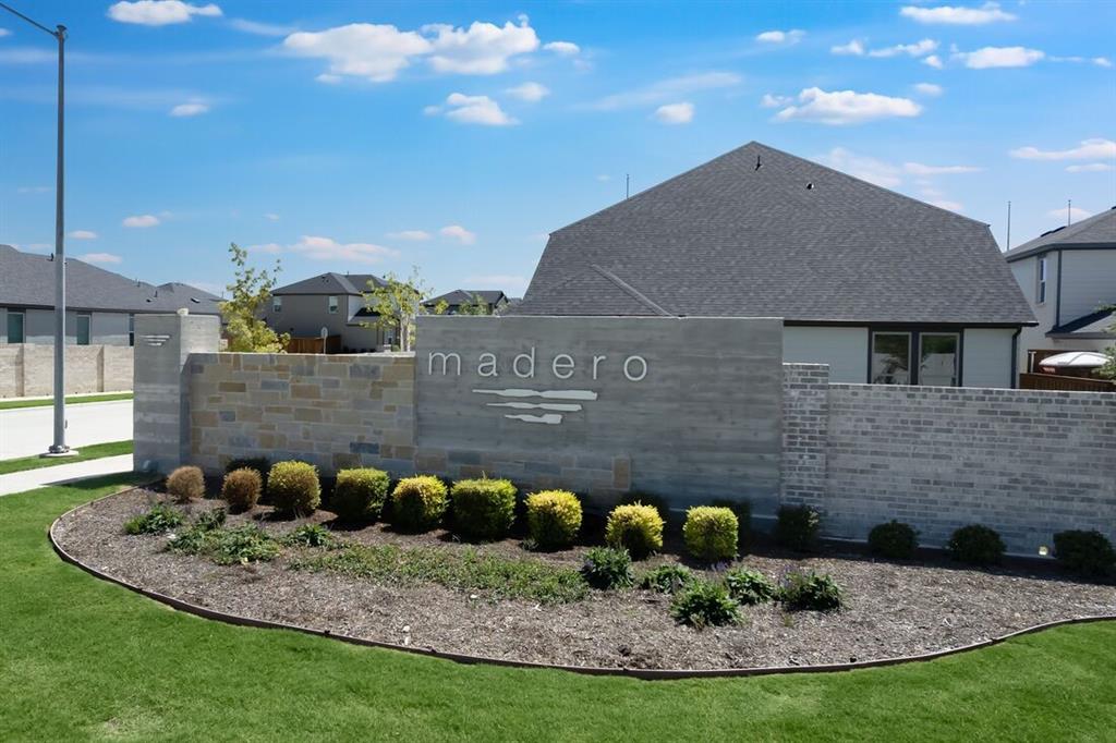 1433 Arciones Road Fort Worth, TX 76052 - Photo 29 of 33 a view of a house with a backyard and sitting area