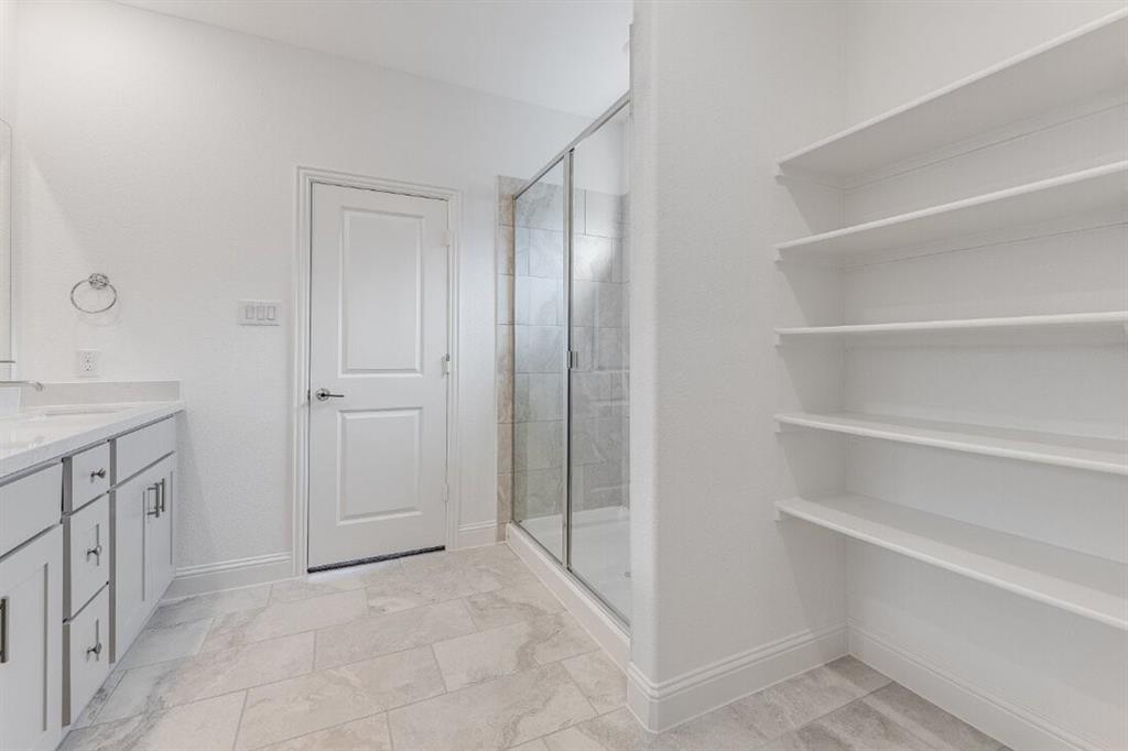 1433 Arciones Road Fort Worth, TX 76052 - Photo 10 of 33 a view of an empty walk in closet