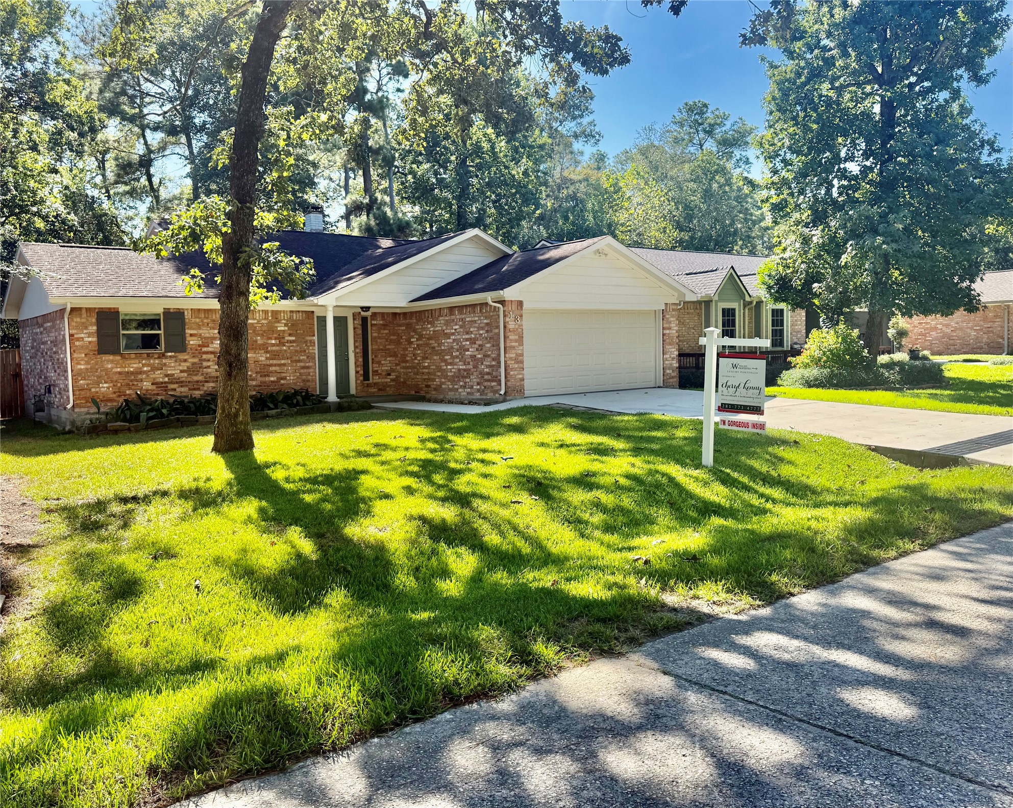 13 Maywind Court The Woodlands, TX 77381 - Photo 1 of 33 Fresh, inviting & move-in ready! Thoughtfully updated home on a cul-de-sac with fresh 2026 exterior paint & new shutters, newer driveway & sidewalk create a welcoming first impression.