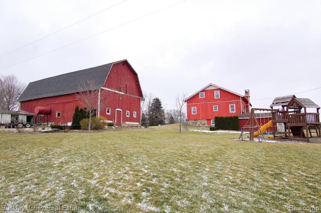 3215 Argentine Road Howell, MI 48855 - Photo 21 of 22 2 Story Storage and Electricity in the Barn