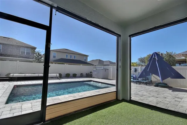 a view of a lake with a building in the background
