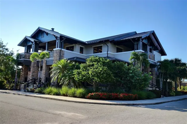 a view of a lake with houses in the back
