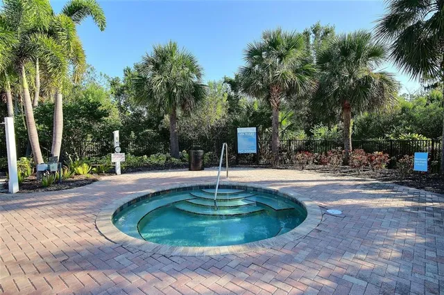 a view of a park with plants and trees
