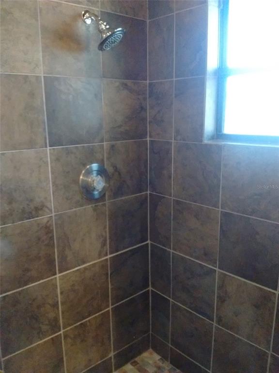 457 Hemlock Street Altamonte Springs, FL 32714 - Photo 12 of 15 a bathroom with a shower