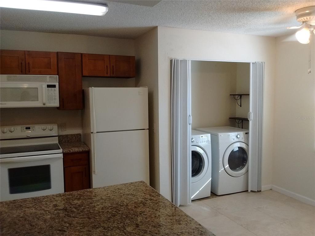 457 Hemlock Street Altamonte Springs, FL 32714 - Photo 4 of 15 a view of kitchen with washer and dryer