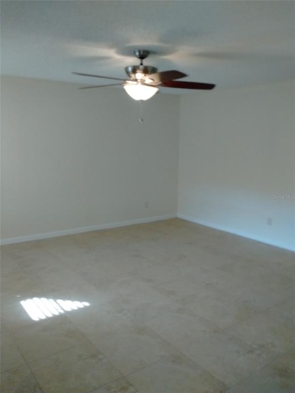 457 Hemlock Street Altamonte Springs, FL 32714 - Photo 6 of 15 a view of a chandelier fan in a room