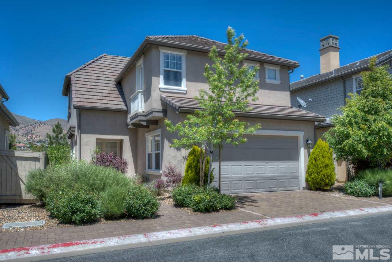 7781 Shalestone Way Reno, NV 89523 - Photo 1 of 24 a front view of a house with garden