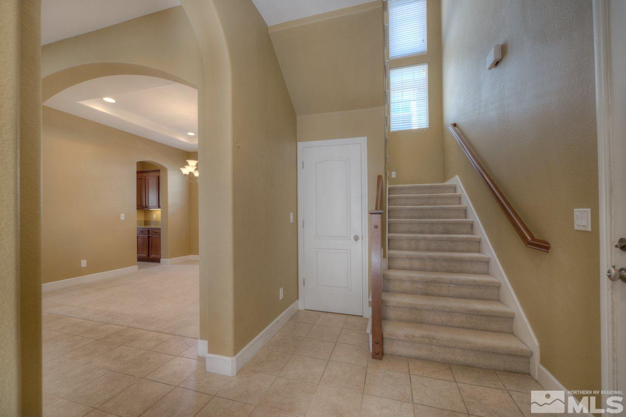 7781 Shalestone Way Reno, NV 89523 - Photo 14 of 24 a view of a hallway view with staircase