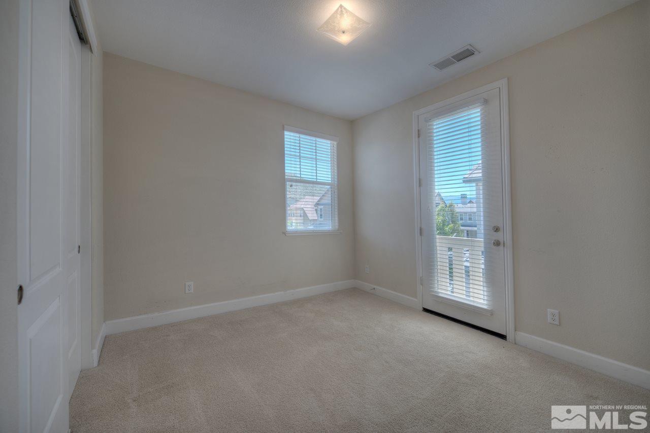 7781 Shalestone Way Reno, NV 89523 - Photo 16 of 24 an empty room with windows