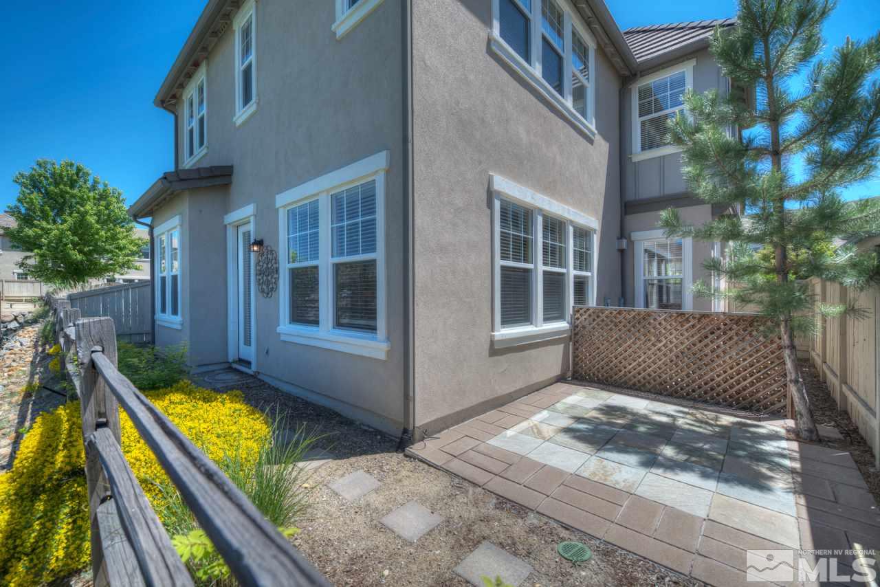 7781 Shalestone Way Reno, NV 89523 - Photo 19 of 24 a view of a house with backyard and sitting area