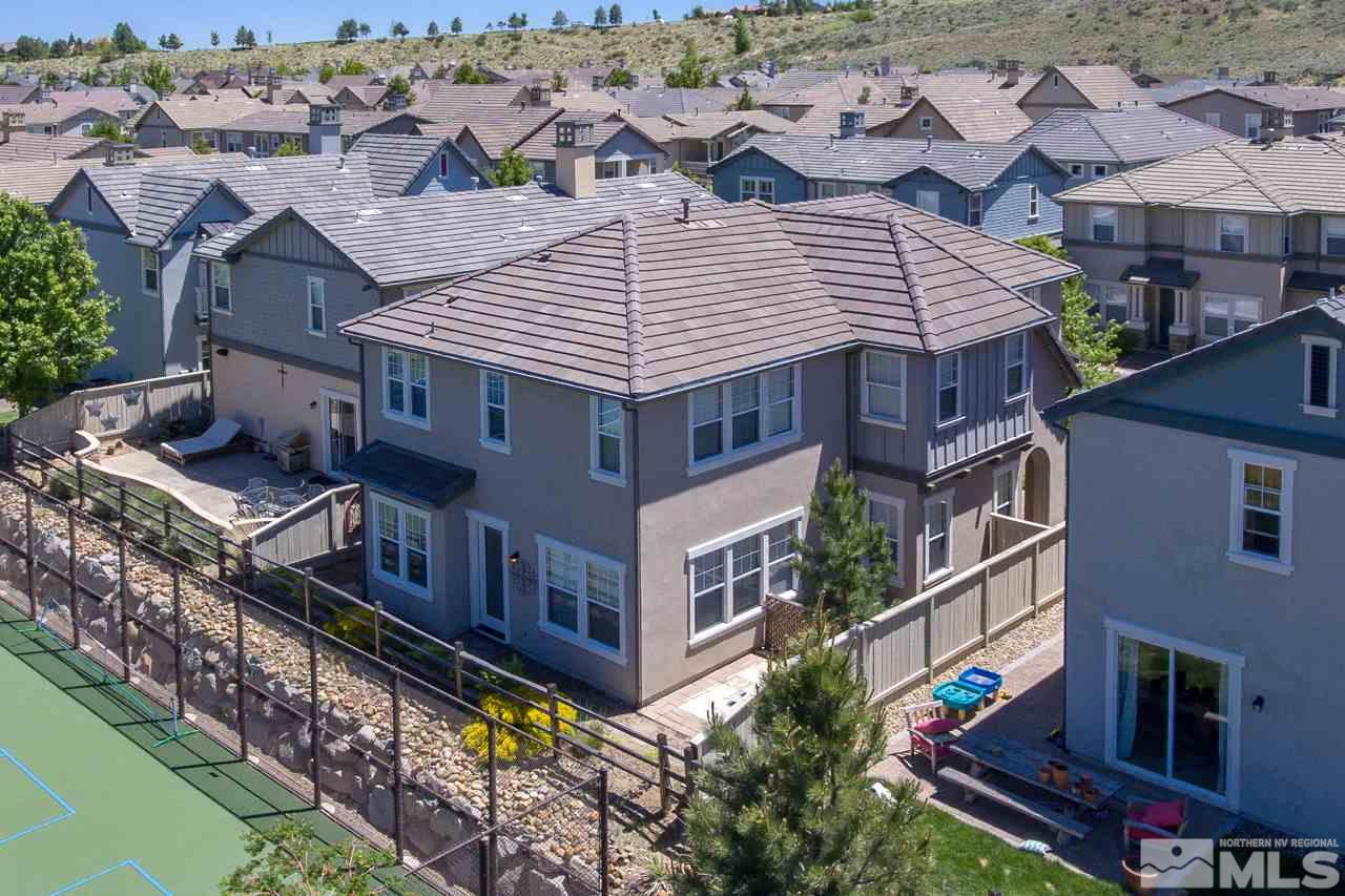 7781 Shalestone Way Reno, NV 89523 - Photo 20 of 24 an aerial view of a house with balcony and trees al around