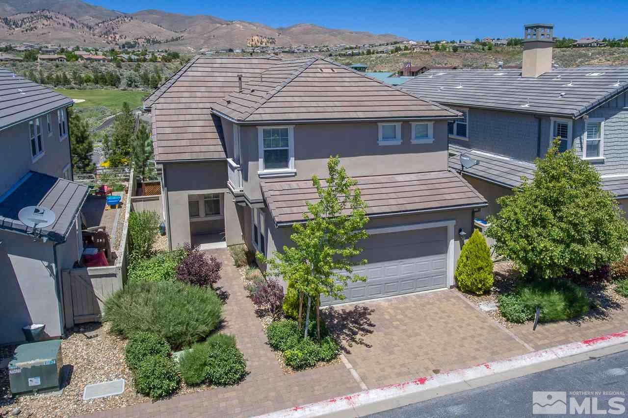 7781 Shalestone Way Reno, NV 89523 - Photo 24 of 24 a front view of a house with garden