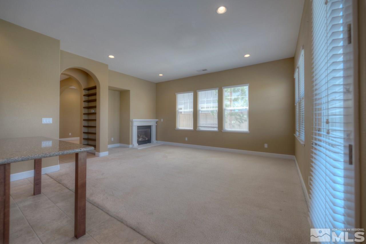 7781 Shalestone Way Reno, NV 89523 - Photo 5 of 24 a view of an empty room with a window