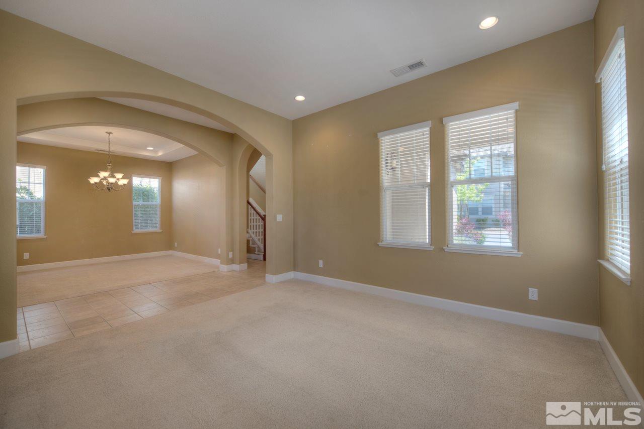 7781 Shalestone Way Reno, NV 89523 - Photo 6 of 24 a view of an empty room with a window
