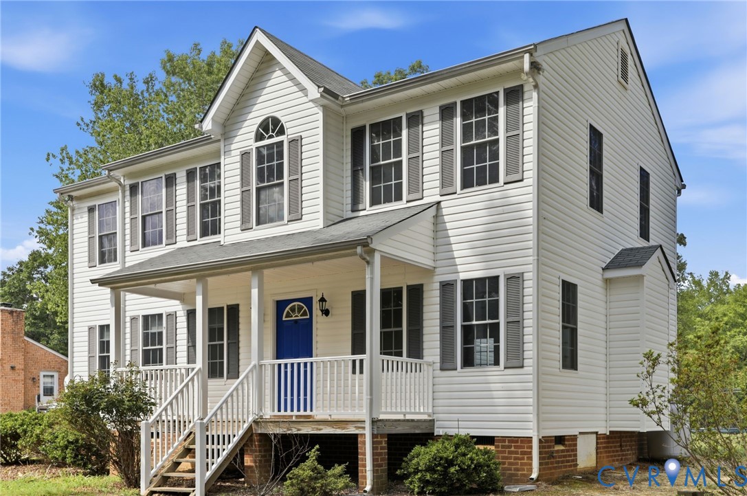 14420 Branding Iron Road Chesterfield, VA 23838 - Photo 4 of 50 White two-story home with a blue front door, gray