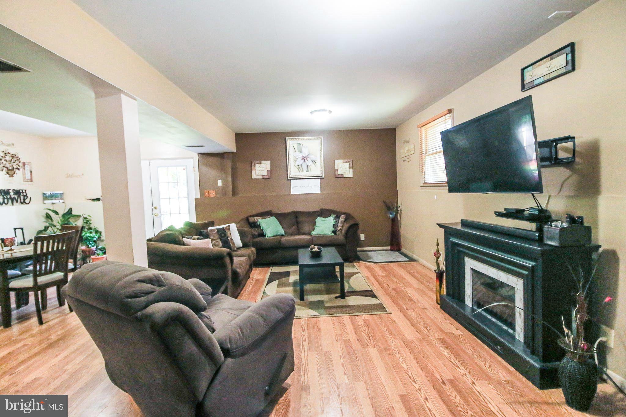 8121 Elizabeth Road Pasadena, MD 21122 - Photo 15 of 28 lower level family room