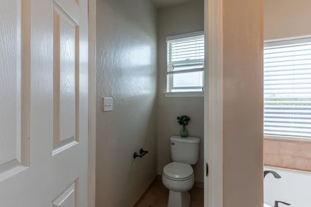 a bathroom with a sink and toilet