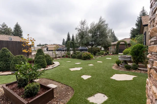 a view of a garden with a slide