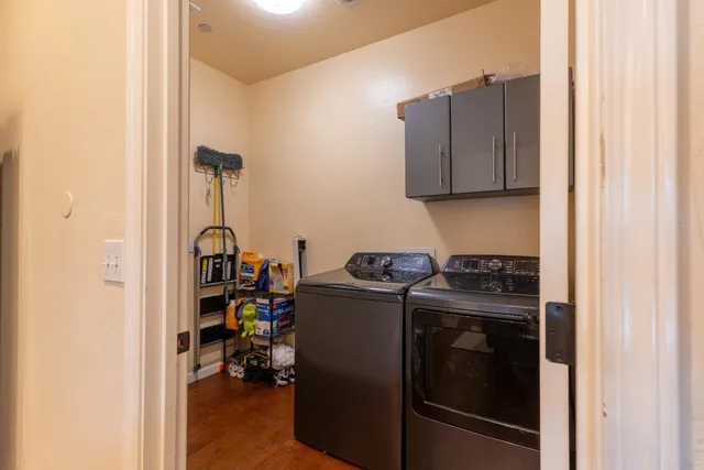 a view of storage and utility room with washer and dryer