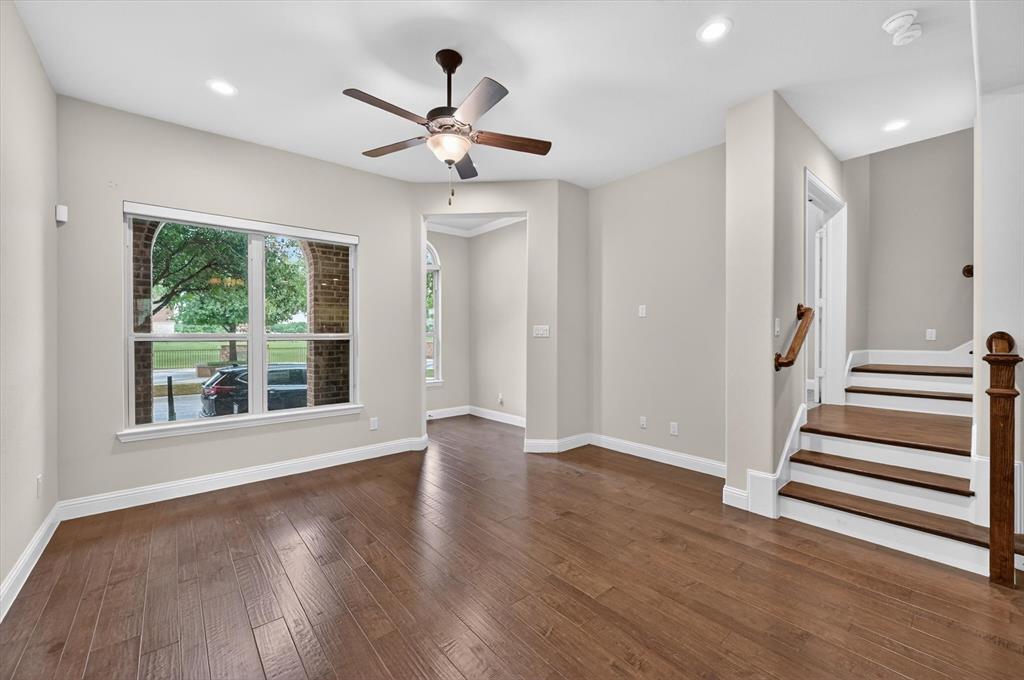 4224 Riverside Drive Flower Mound, TX 75028 - Photo 4 of 23 wooden floor in an empty room with a window