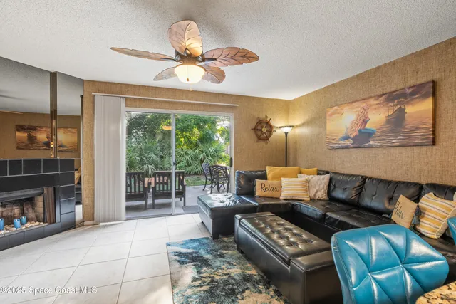 a bedroom with a bed and a mirror on the dresser