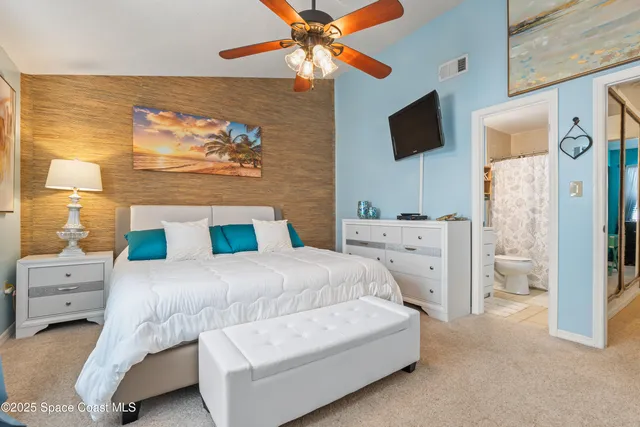 an aerial view of residential houses with outdoor space and street view