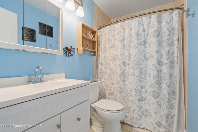 a view of balcony with wooden floor and fence