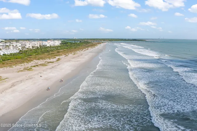 an aerial view of a city with lots of residential buildings