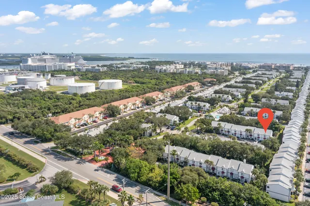 a living room with furniture windows and a fireplace