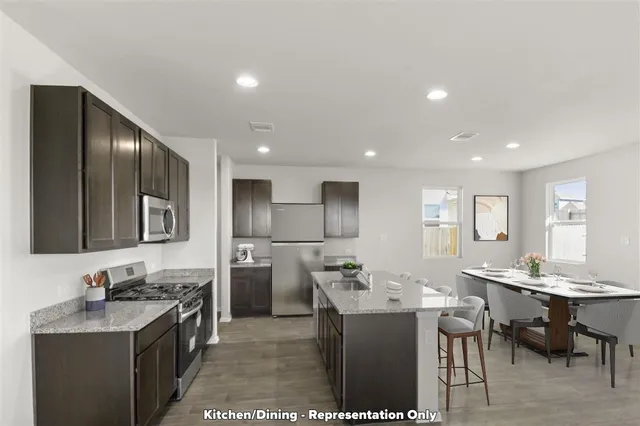 a bedroom with a large bed and a couch