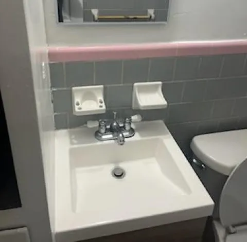 a bathroom with a white bath tub